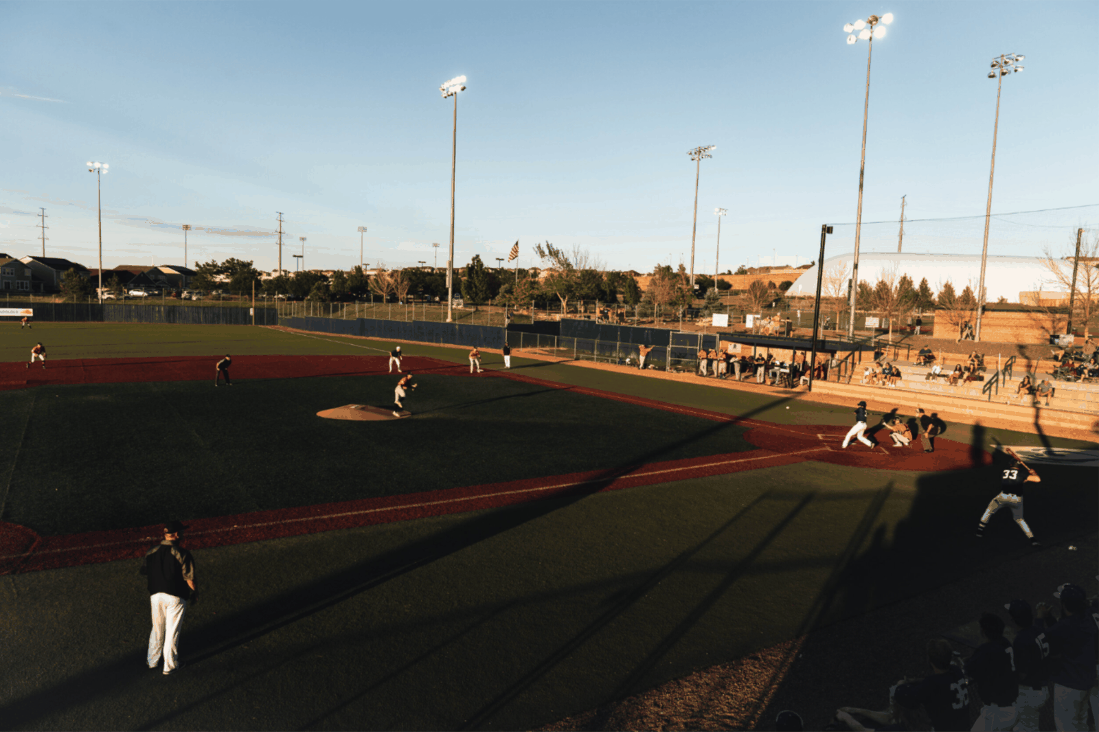 Gameday Baseball game action under the lights at Double Angel Fields in Parker, Colorado